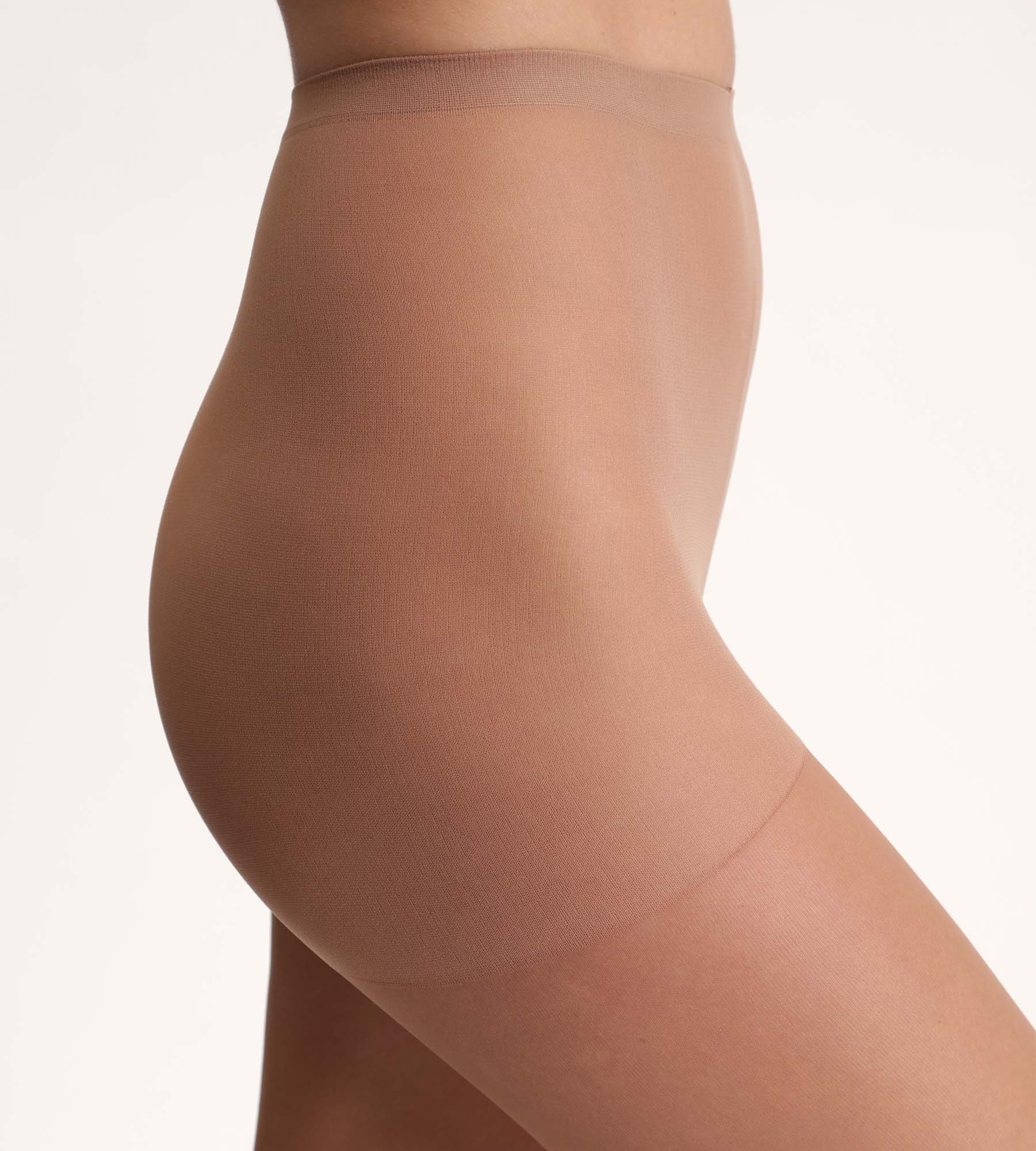 DIM Hautfarbene transparente Strumpfhose 15D - Beauty Resist