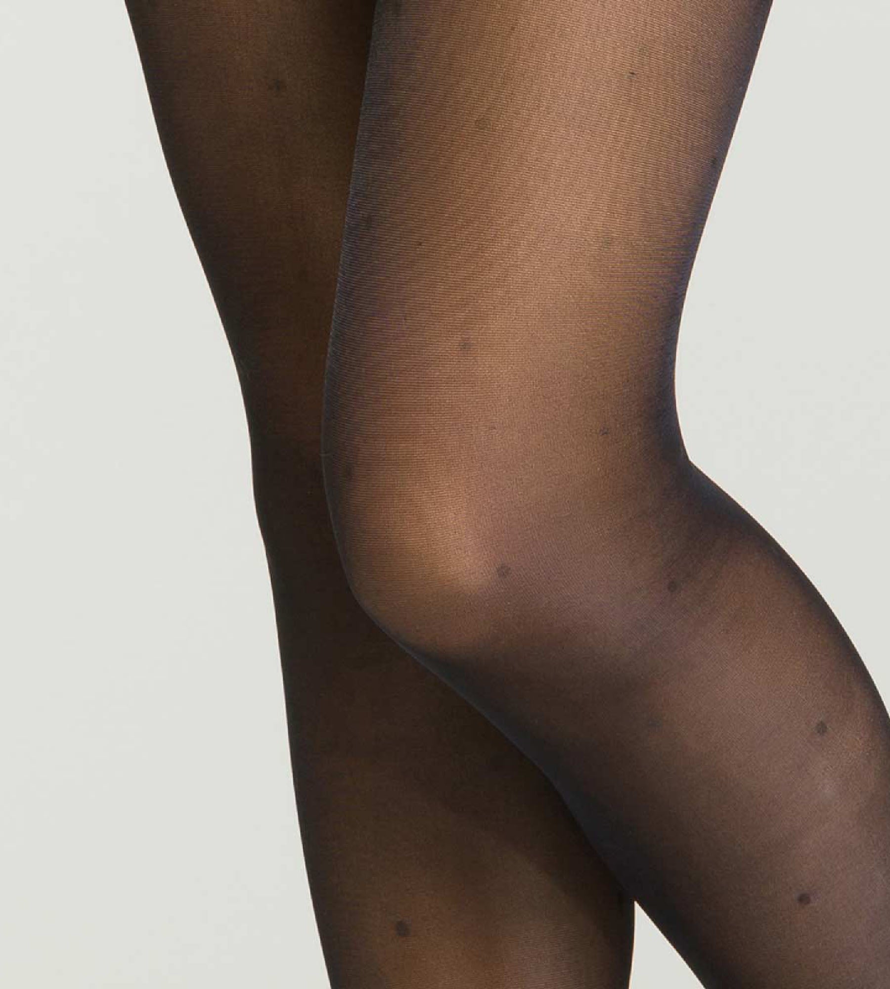 DIM Schwarze transparente Strumpfhose 25D leicht stützend mit Pünktchen - Perfect Contention