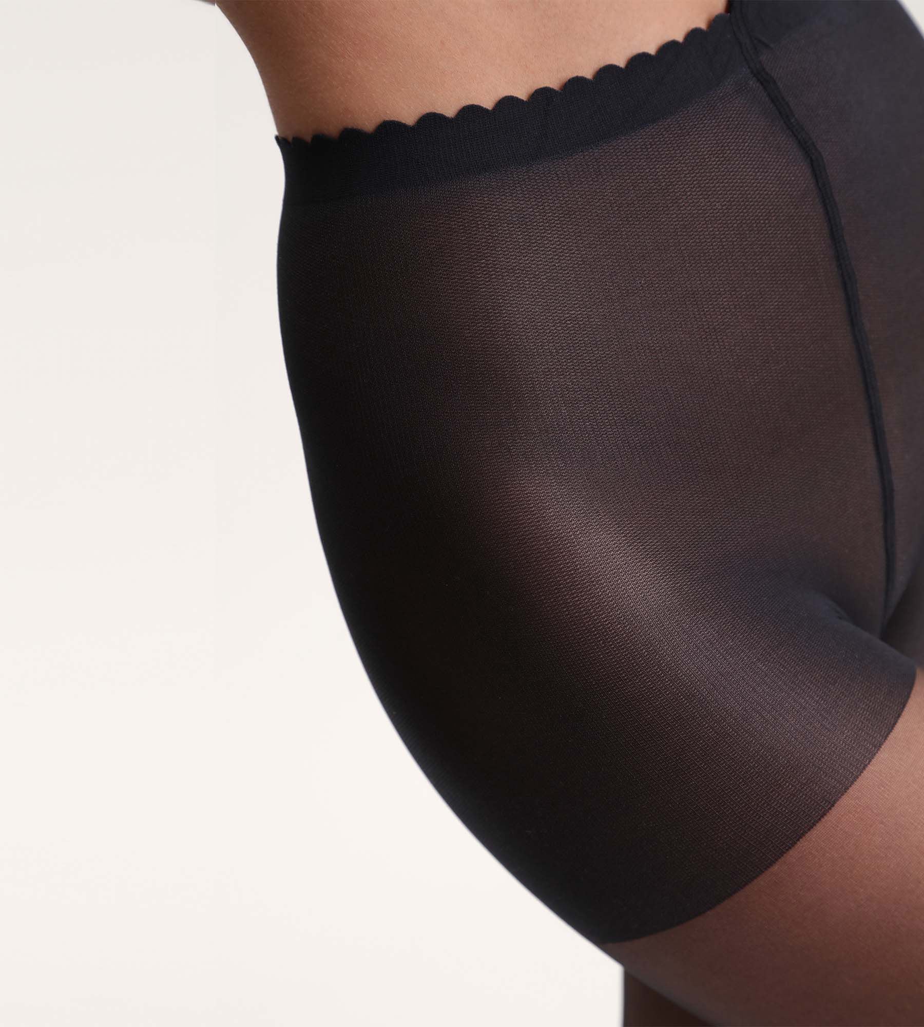 DIM Transparente Strumpfhose schwarz mit Nude-Effekt 17D Body Touch