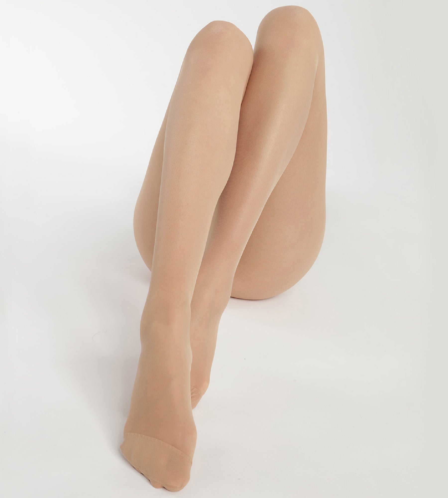 DIM Transparente Strumpfhose 20D mit Anti-Laufmaschen-Technologie in Nude - Ultra Resist