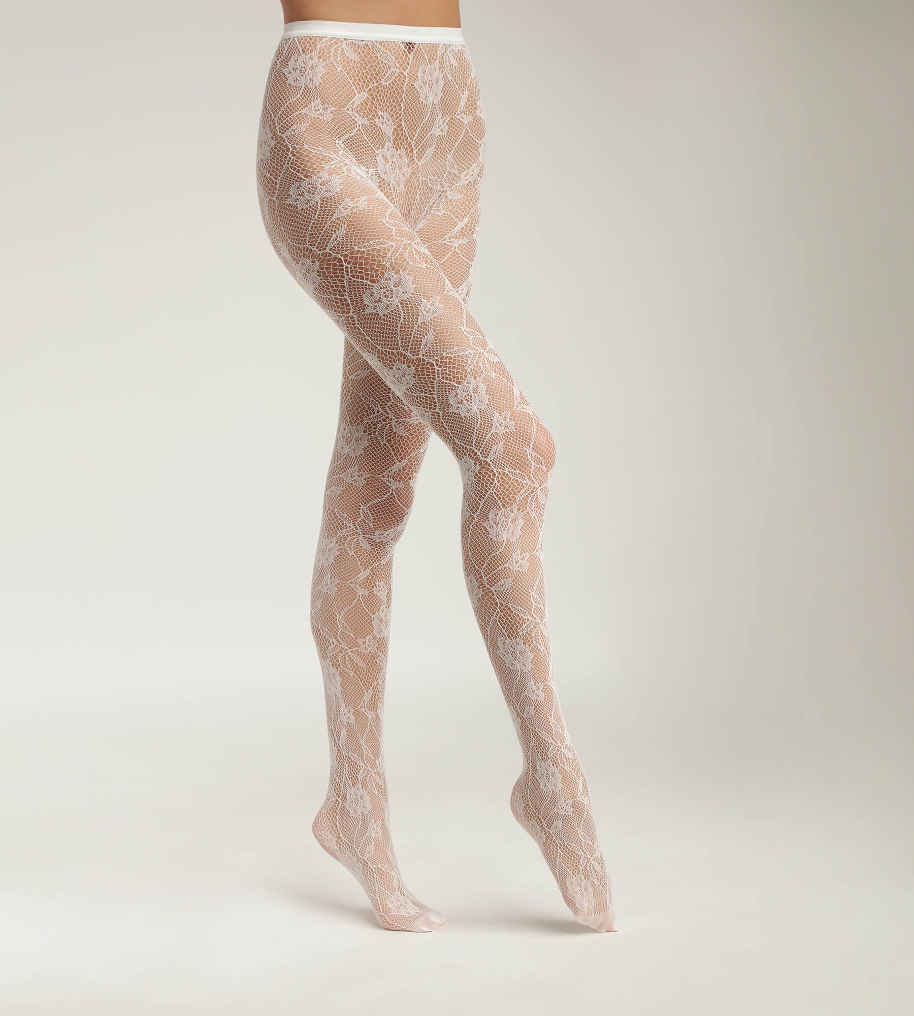DIM Weiße Strumpfhose in Spitzenoptik mit Blüten -- DIM Style