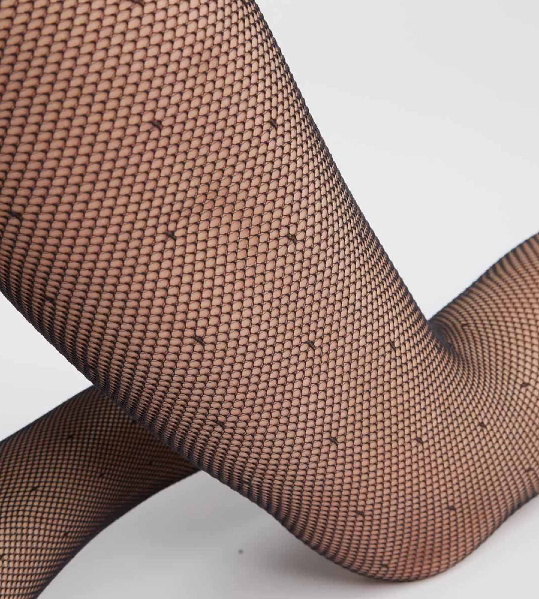 DIM Schwarze Netzstrumpfhose mit hohem Beinausschnitt und Pünktchen - DIM Style