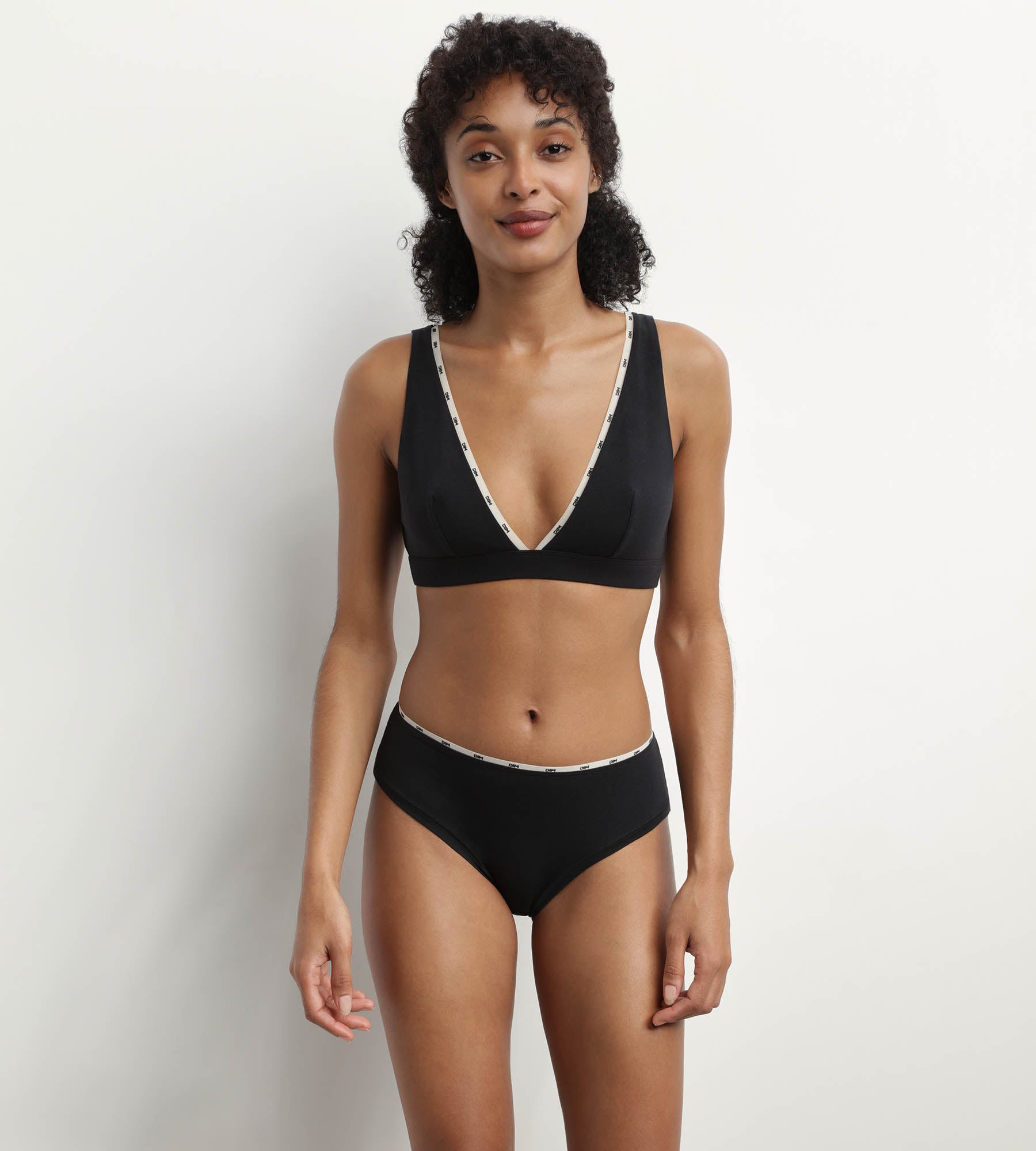 DIM Schwarzer Slip aus Stretch-Baumwolle mit Zierbündchen - Icons Essentiel