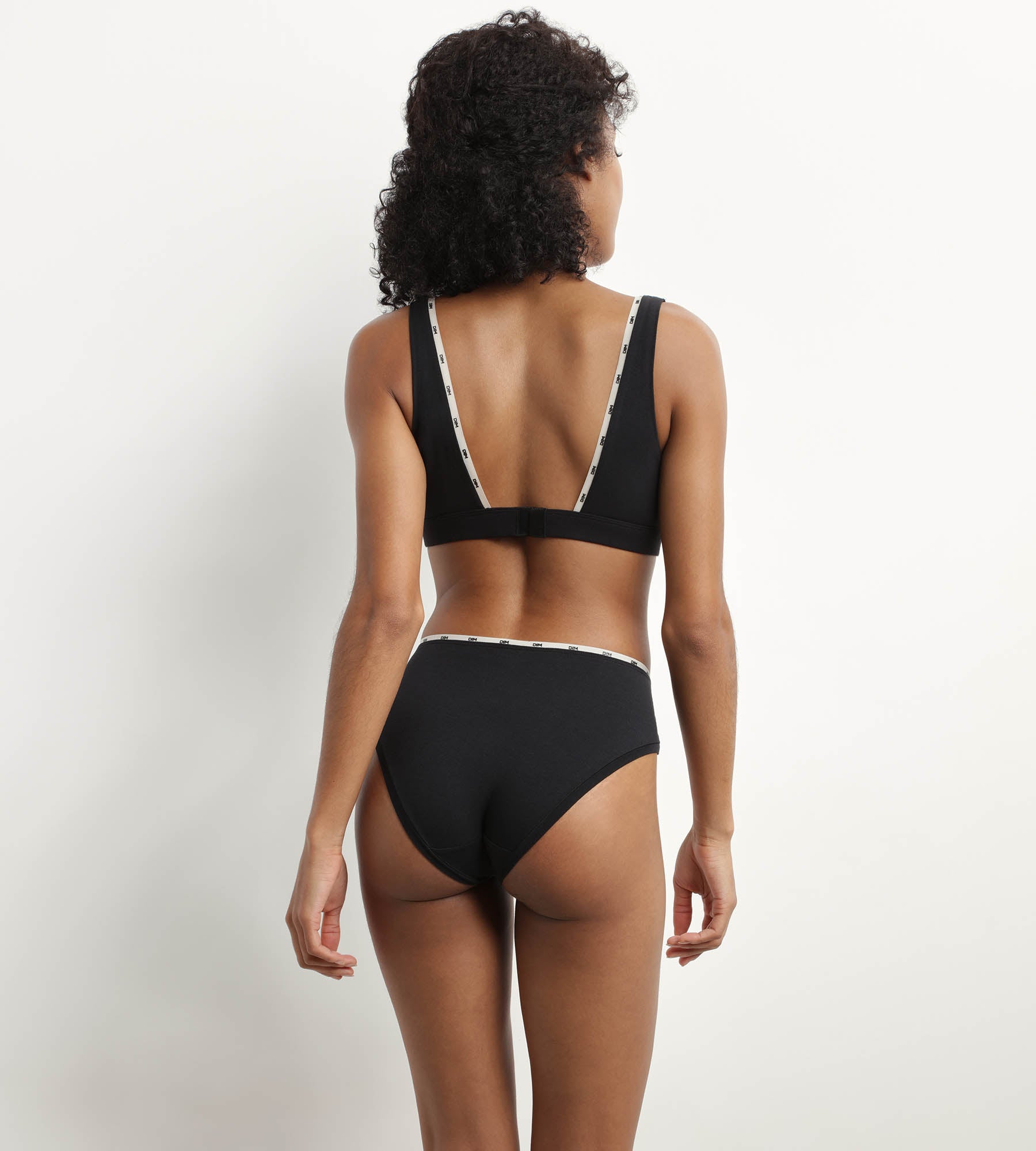 DIM Schwarzer Slip aus Stretch-Baumwolle mit Zierbündchen - Icons Essentiel