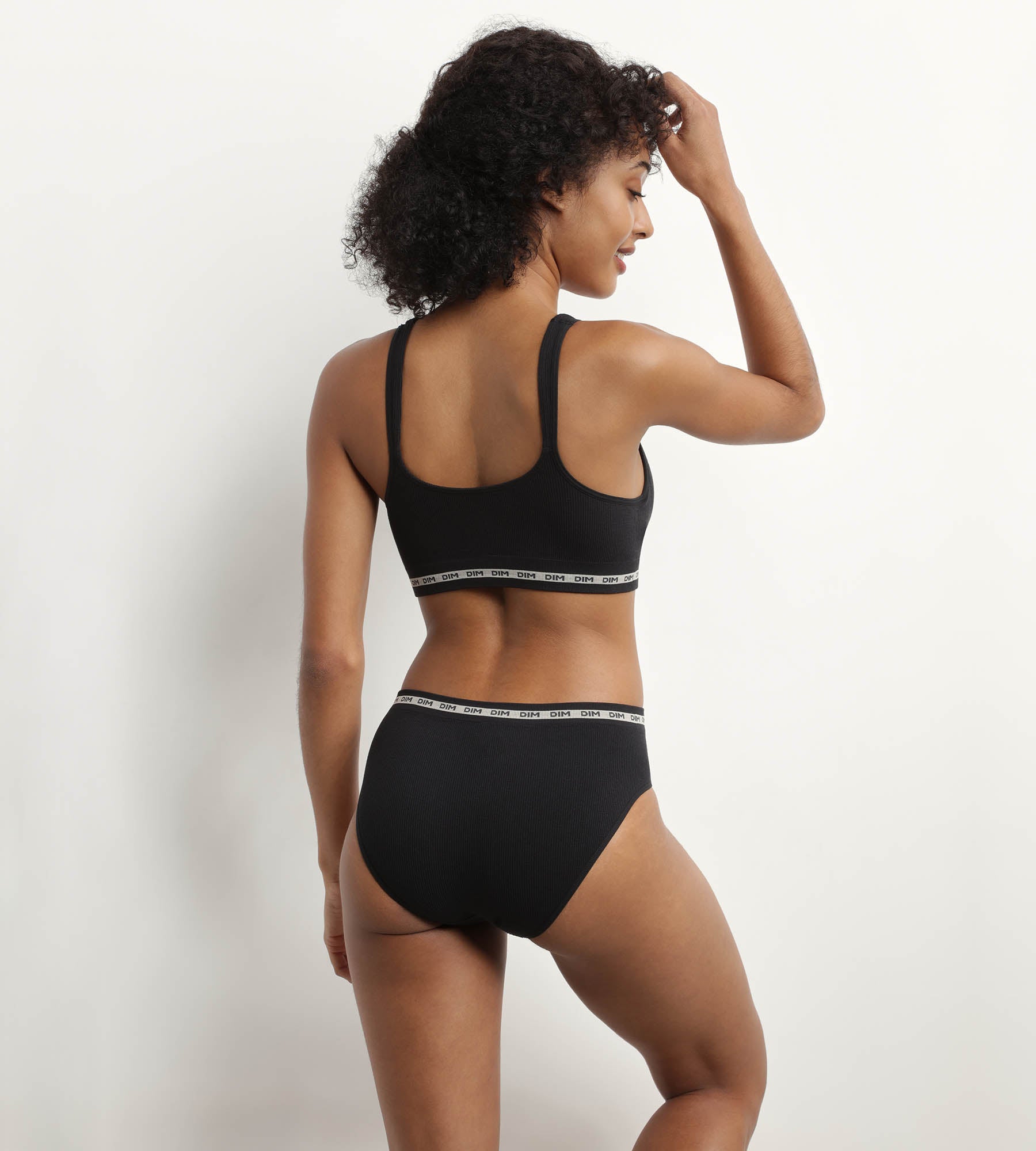 DIM Schwarzer Slip aus gerippter Mikrofaser - Icons Seamless