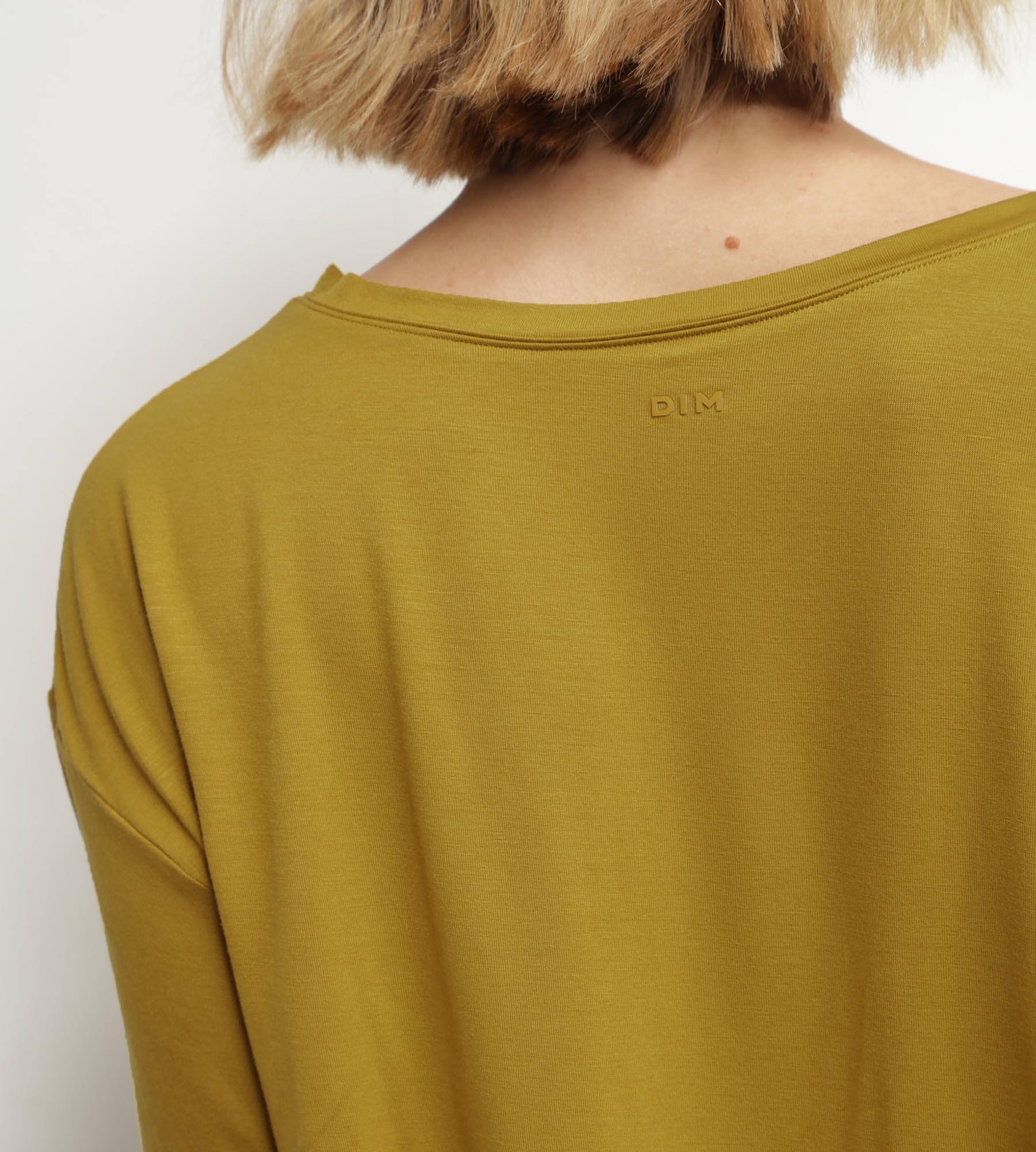 DIM Sport-T-Shirt für Damen in Olivgrün Viskose mit offenem Rücken Dim Move