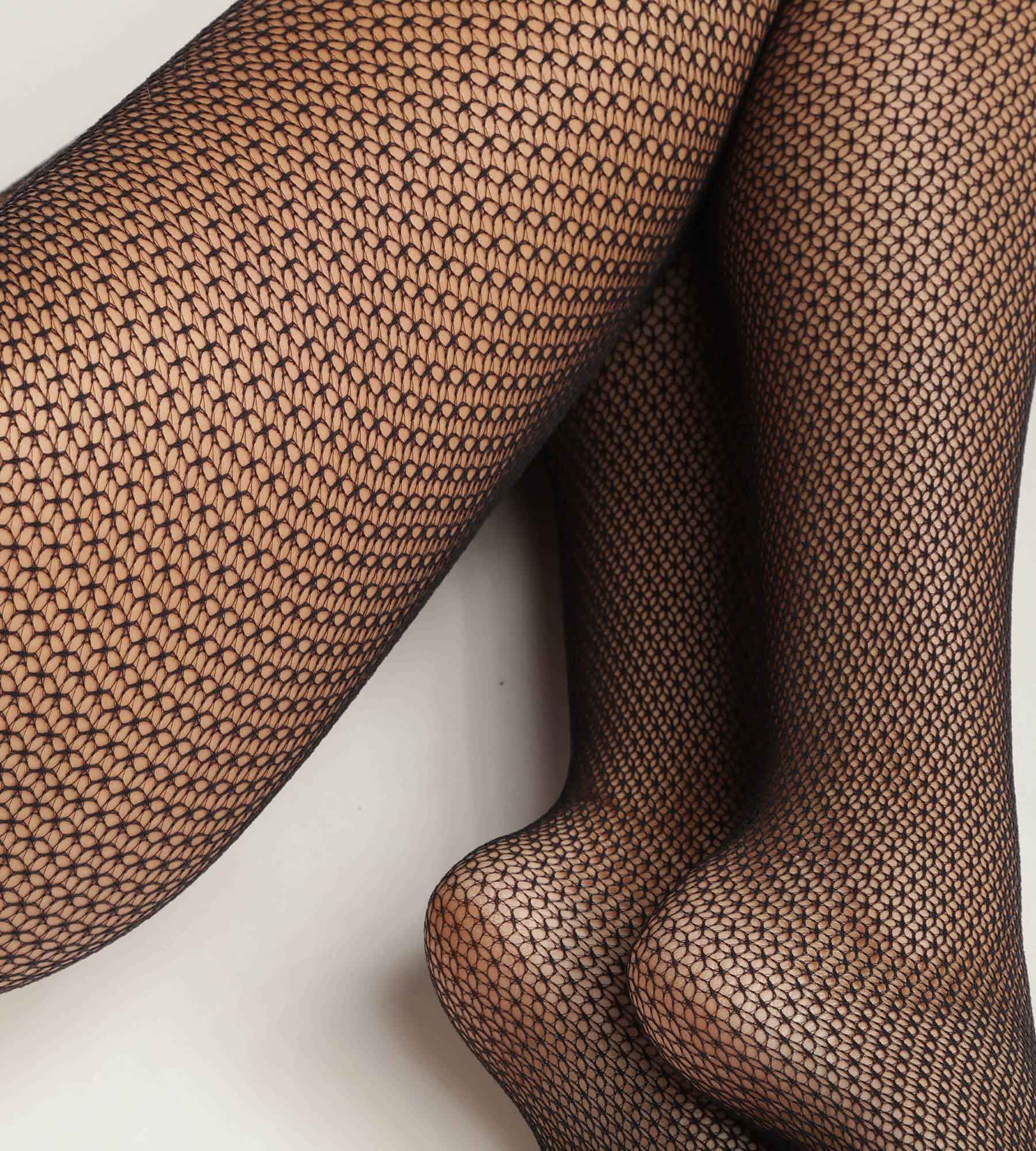 DIM Schwarze Strumpfhose aus geometrischer Spitze- DIM Style