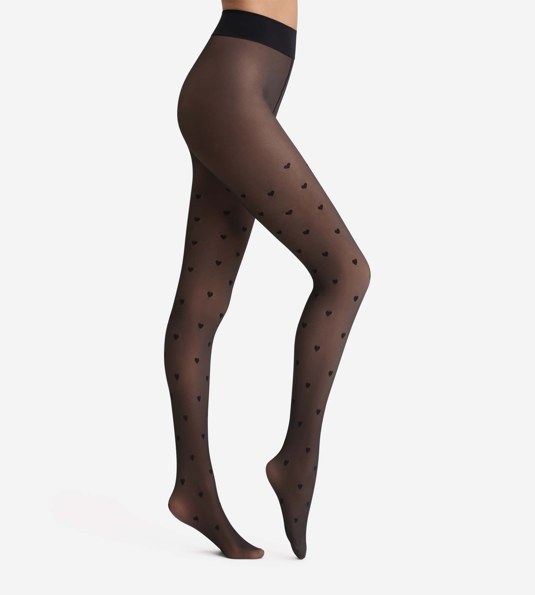 DIM Warme Strumpfhose mit transparentem Effekt schwarz mit Herzchen Thermo