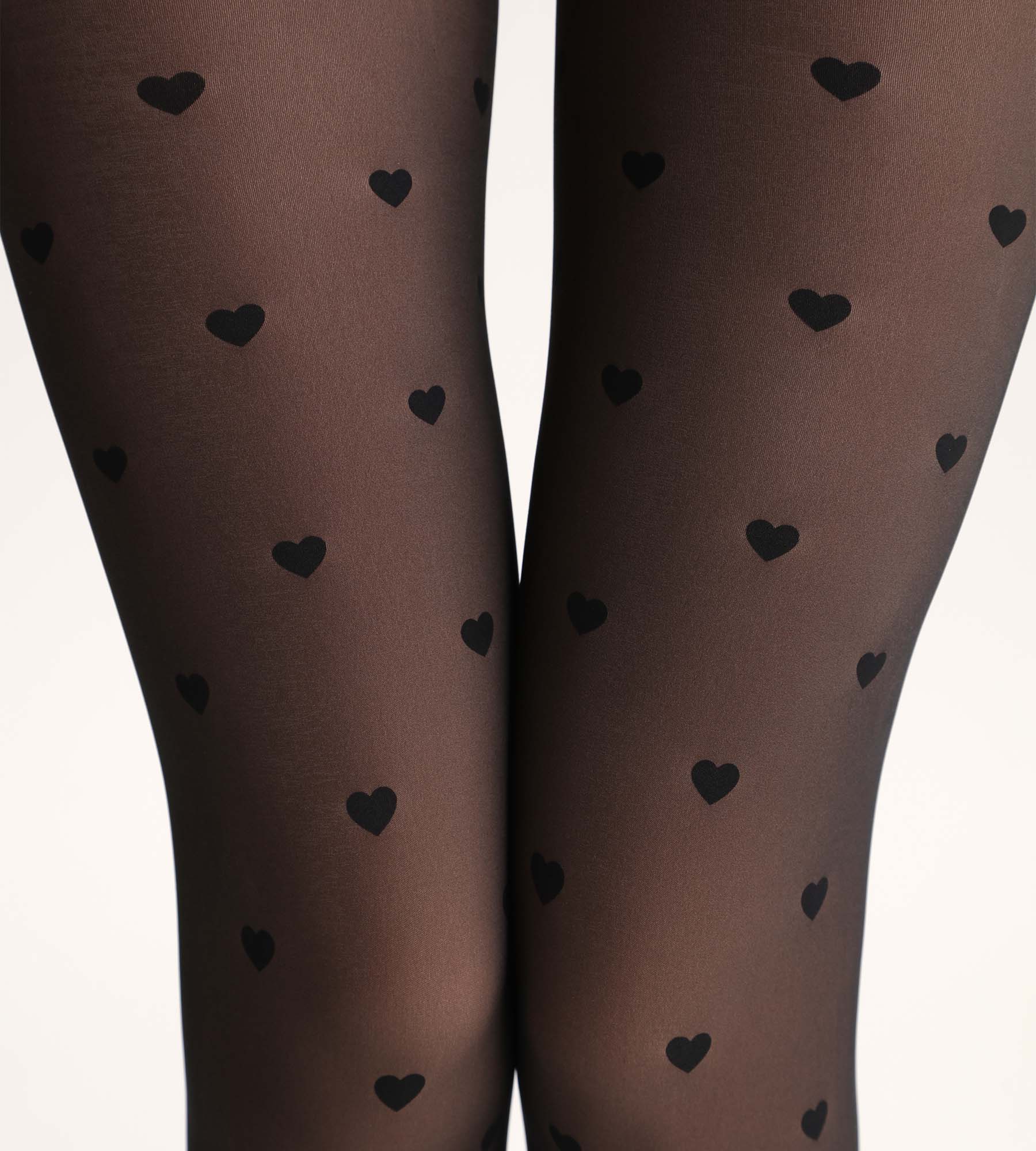 DIM Warme Strumpfhose mit transparentem Effekt schwarz mit Herzchen Thermo