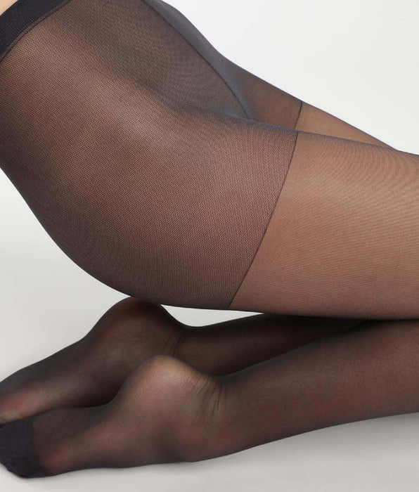 DIM Transparente Strumpfhose 20D mit Anti-Laufmaschen-Technologie in Schwarz - Ultra Resist