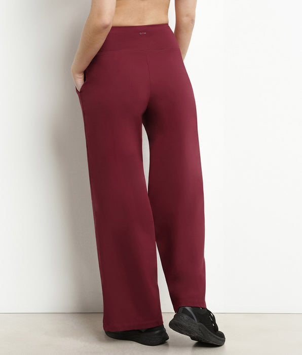 DIM Damen-Sporthose mit weitem Bein aus bordeauxfarbenem Stretch-Jersey Dim Move