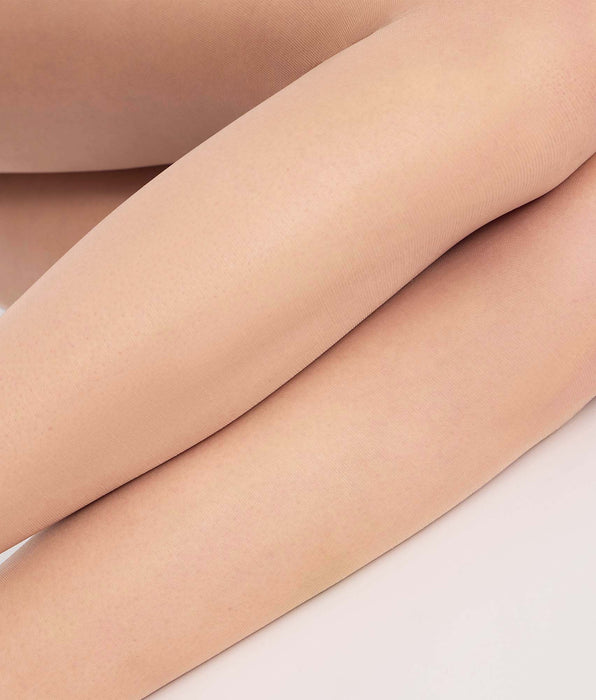DIM Transparente Strumpfhose ohne Naht in Hell-Nude