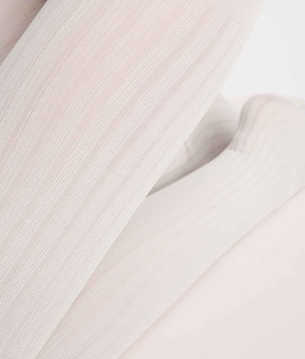 DIM Cremefarbene 50D-Strumpfhose mit flachem Rippenmuster von DIM x Ines de La Fressange